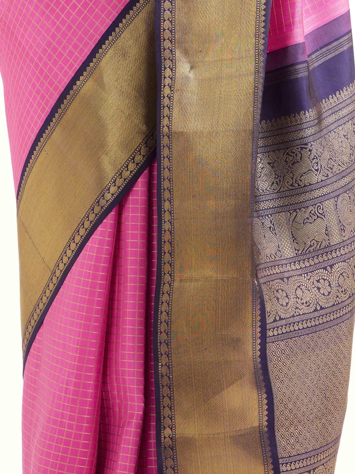 Detail view of mauve silk Kancheepuram saree showing silk texture and zari craftsmanship