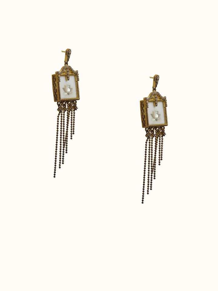angled view of parchinkari silver drop earrings