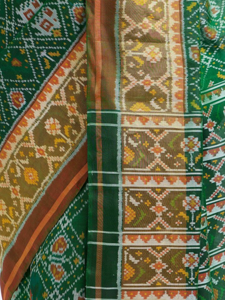 Detailed view of Rajkot Patola Ikat Saree focusing on the fine craftsmanship and texture