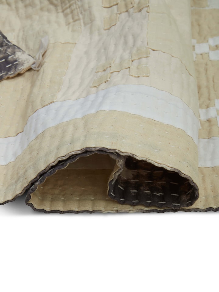 Texture and patchwork pattern detail of Siddi single bedspread