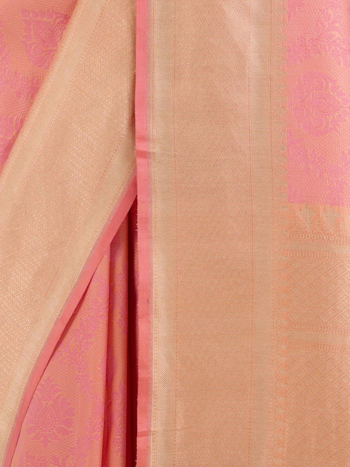 Detail view of pink silk Banarasi saree showcasing fine Banarasi craftsmanship
