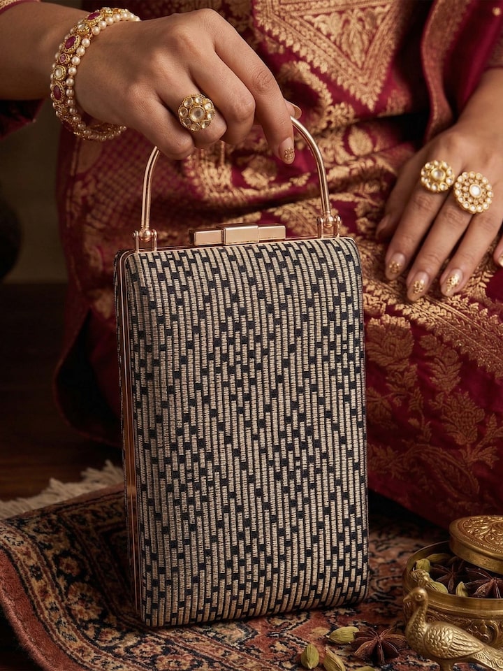 Styled view of Black Banarasi Silk Handbag showing the bag styled with an outfit