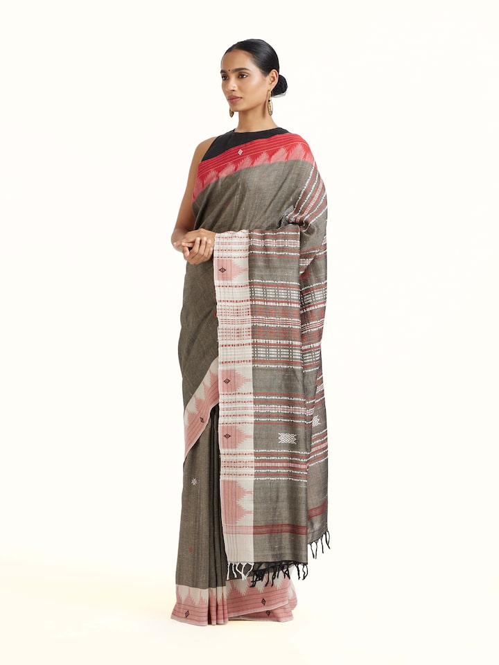 Side view of Brown Cotton Tussar Silk Kotpad Saree highlighting the detailed craftsmanship and elegant silhouette