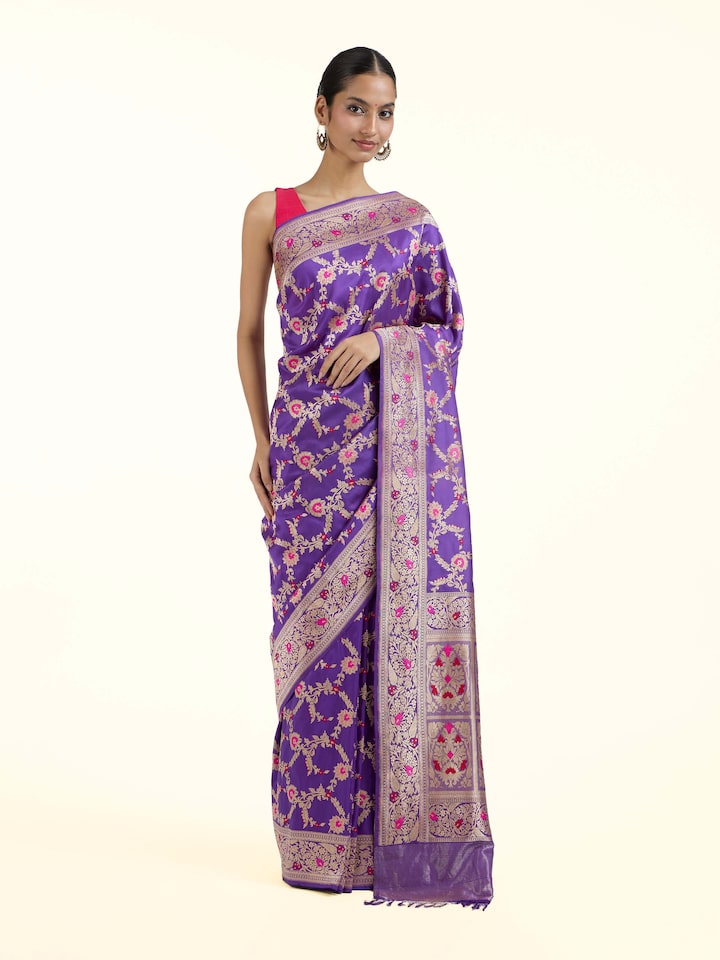Front view of purple mulberry katan silk Banarasi saree with rich zari motifs