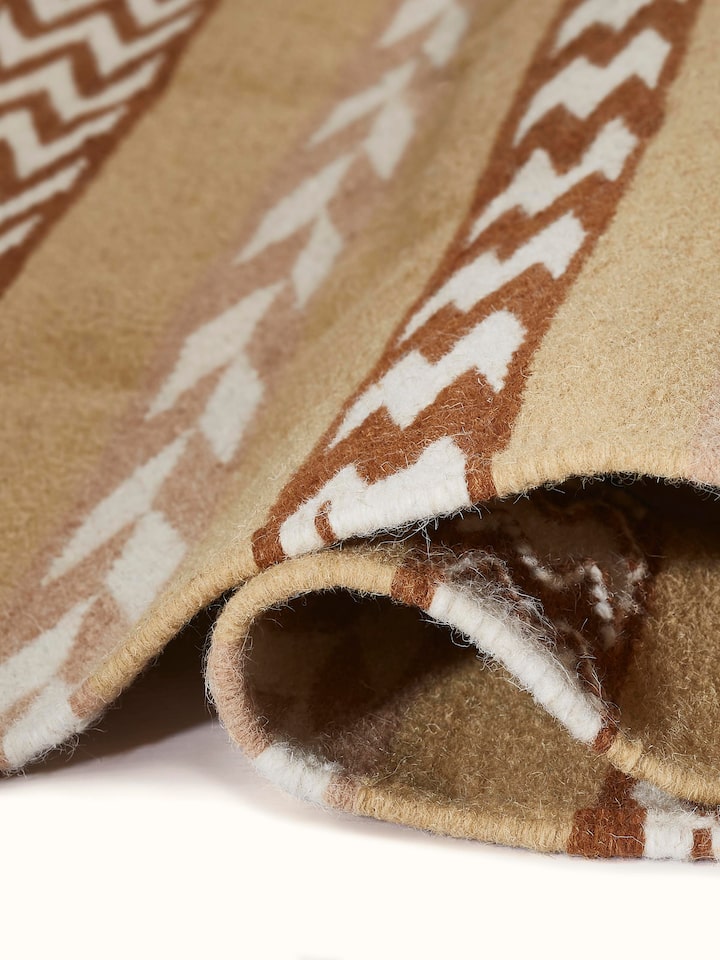 Close-up view of Chevron Stripes Yellow Gujarat Wool & Cotton Panja Dhurrie Kharad highlighting the stripe detail.