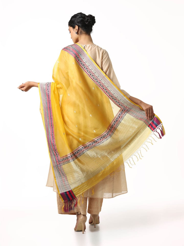 Detailed texture and zari border of yellow Banarasi silk dupatta