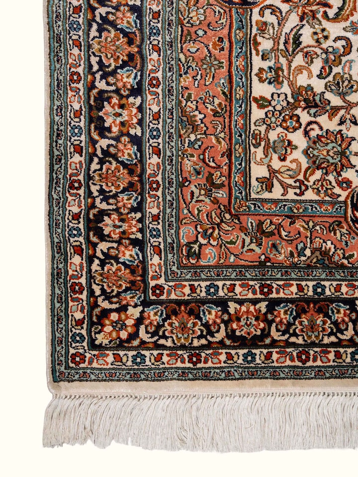 Detail view of Traditional Persian Ivory Rust Kashan Kashmir Silk Hand-Knotted Carpet highlighting the intricate pattern and pile texture