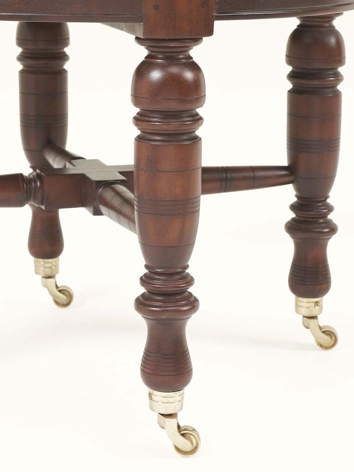 Close-up view of Mahogany wood and cane study chair highlighting cane mesh texture and polished wood