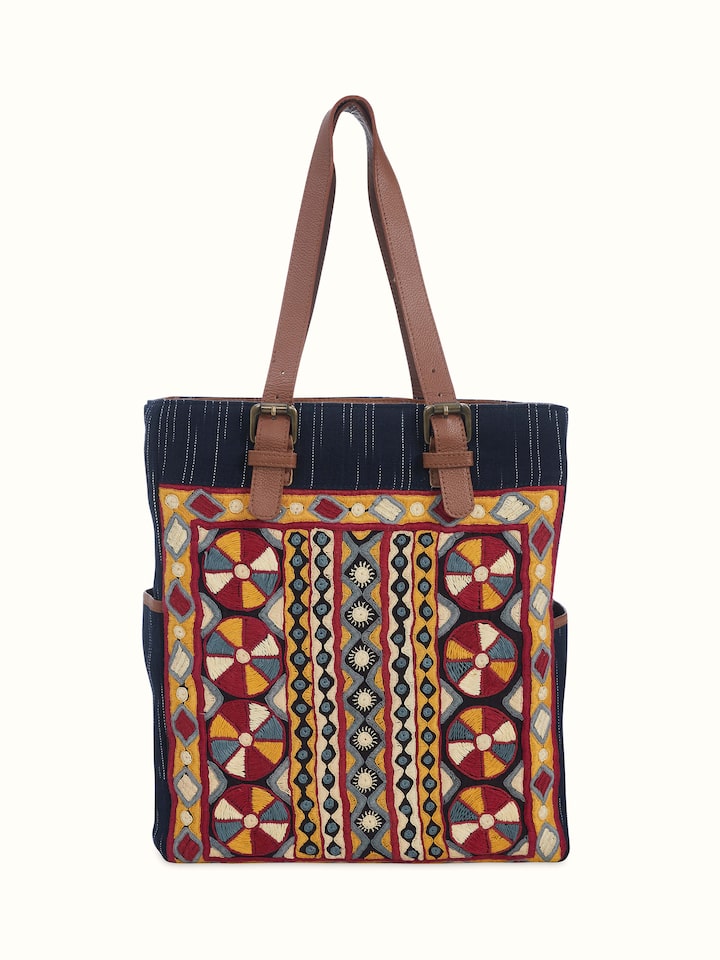 Front view of Grey Leather & Textile Embroidered Tote Bag featuring intricate embroidery and sturdy leather.