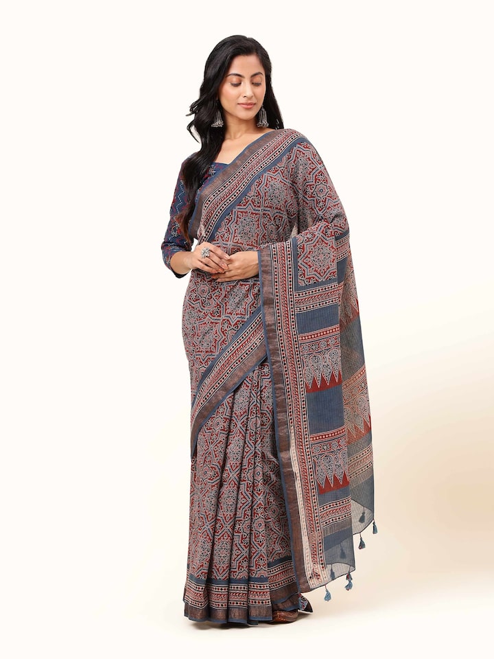 Front view of blue Maheshwari Ajrakh block printed saree with traditional geometric patterns.