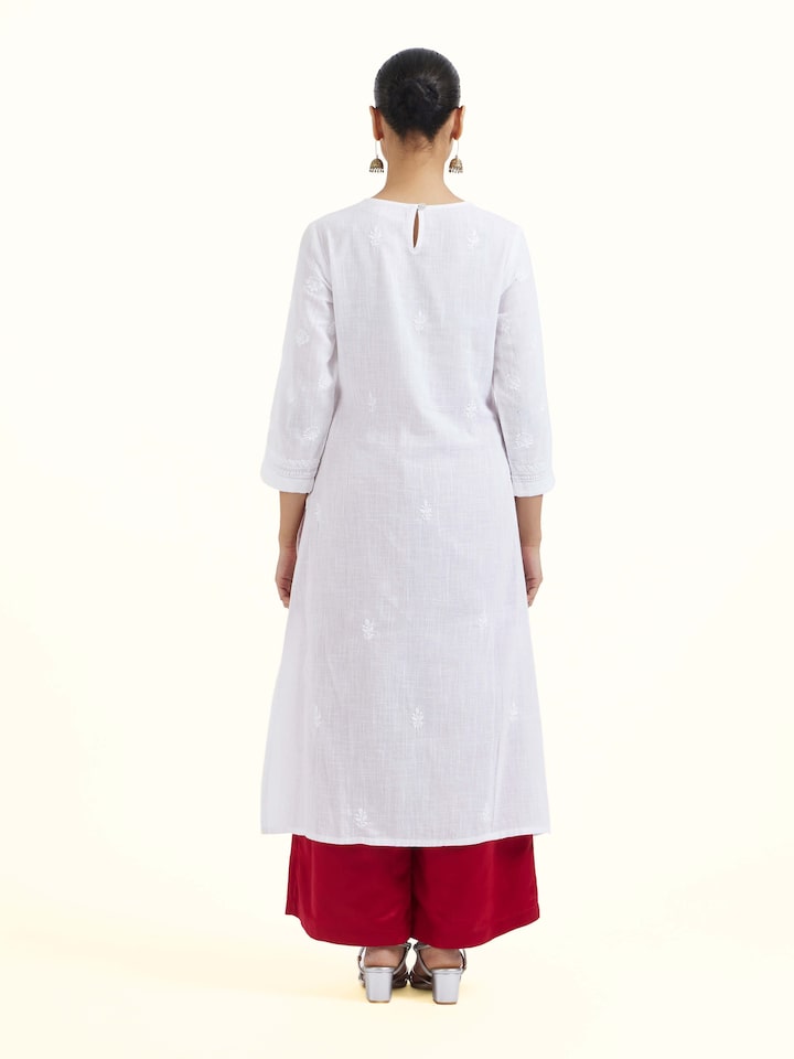 Back view of red silk Banarasi palazzos displaying overall design