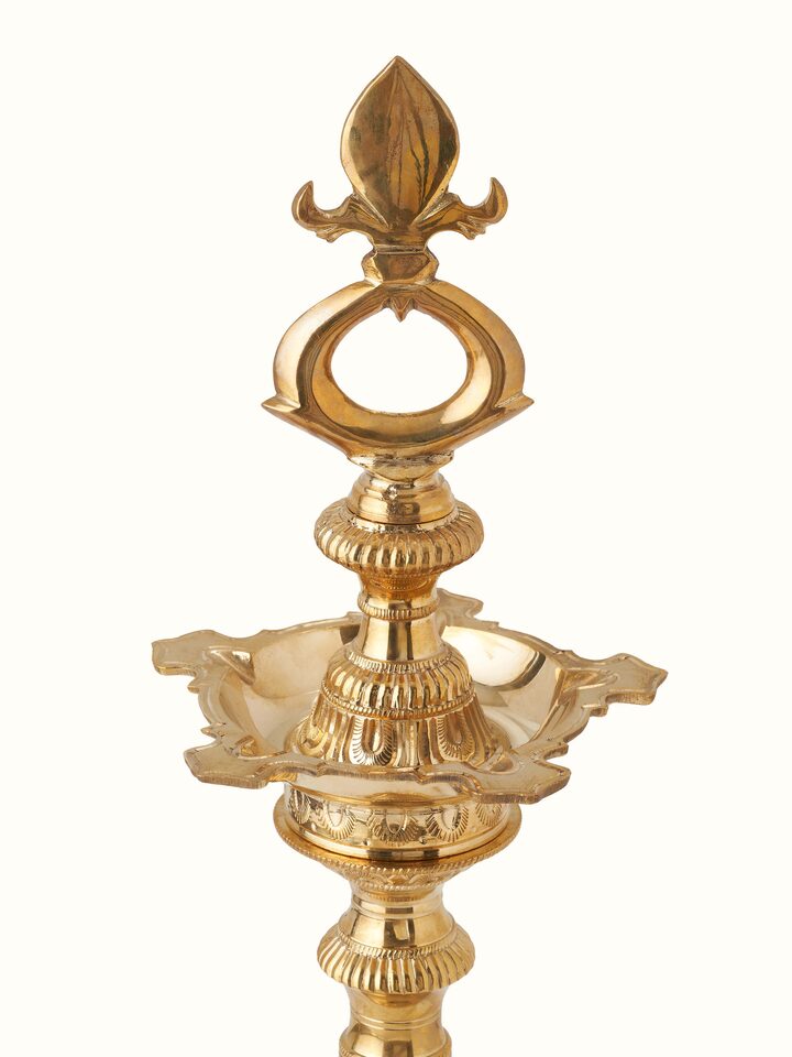 Alternate view of Vilakku Carved Brass Stand Diya focusing on its ornate design and stand.