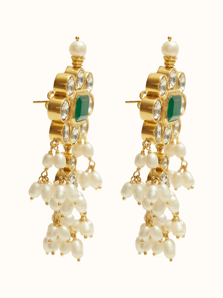 Lifestyle view of guttapusalu silver drop earrings