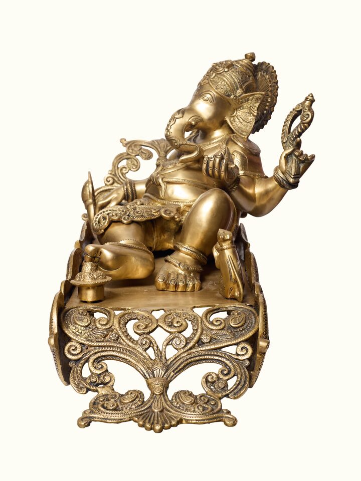 Side view of the Brass Ganesha Sitting Peacock Idol