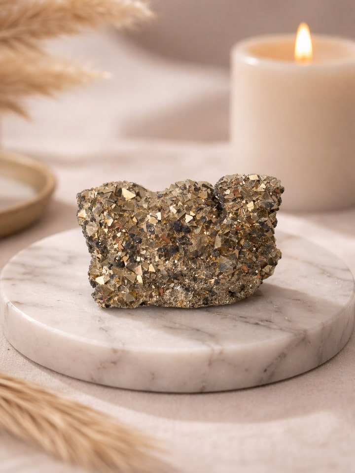 Styled view of Gemstone Pyrite Geode Mini Healing Stone styled in a home setting