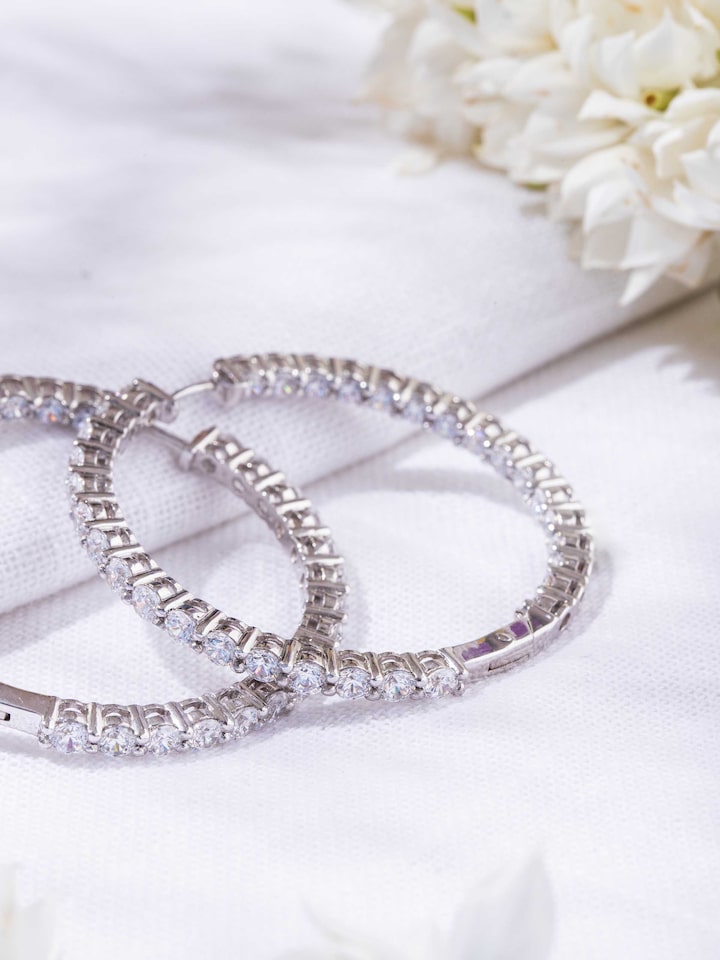 Detailed side view of the Silver Smithing Silver Hoop Earrings