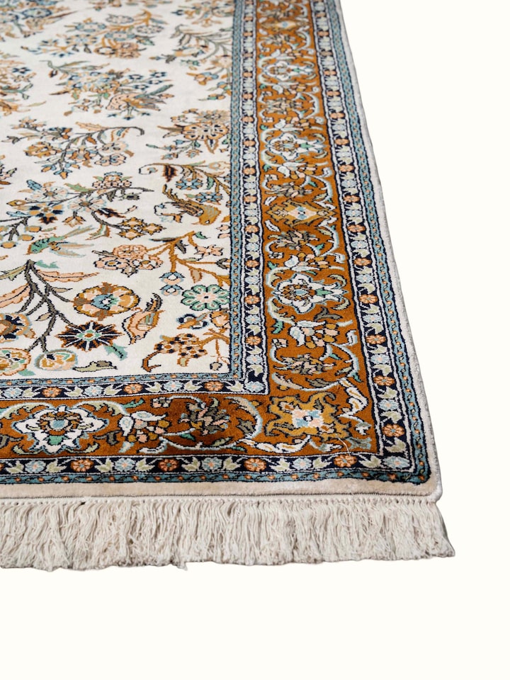 Close-up view of Traditional Persian Ivory Mahal Kashmir Silk Hand-Knotted Carpet highlighting the hand-knotted weave and motif detail