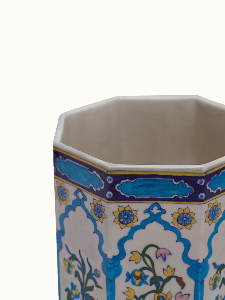 Close-up detail of blue pottery Jharokha planter highlighting glaze and artwork