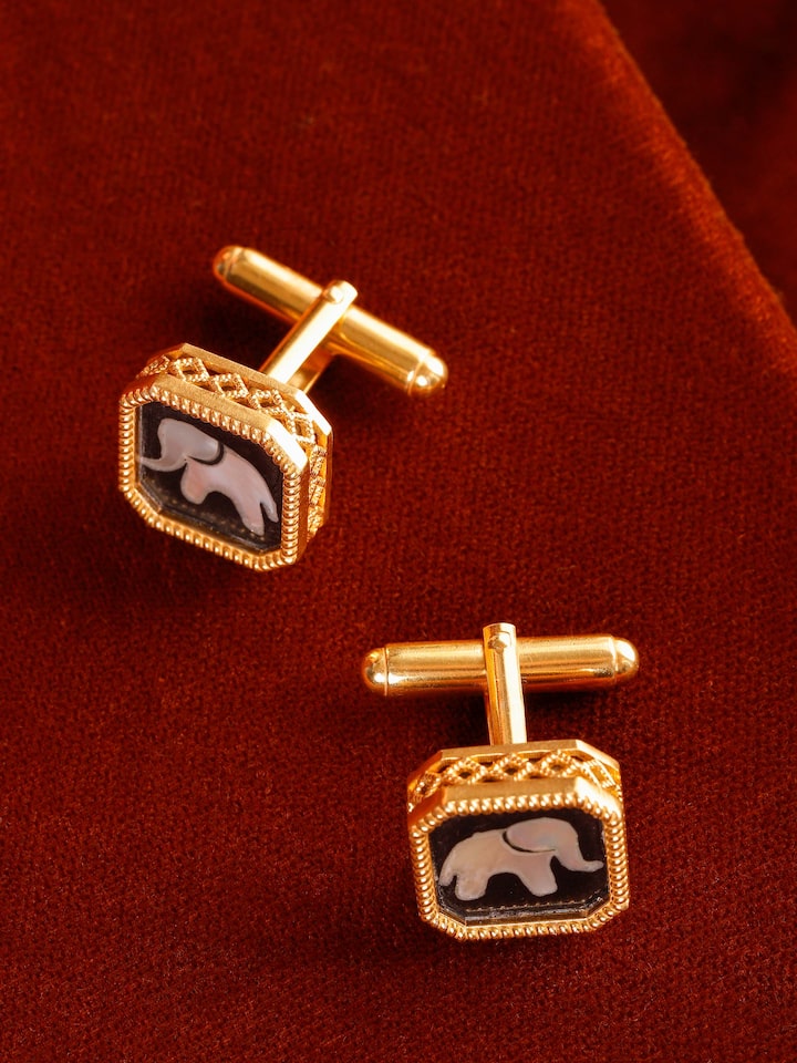 Parchinkari silver cufflinks displayed on shirt cuff – Swadesh