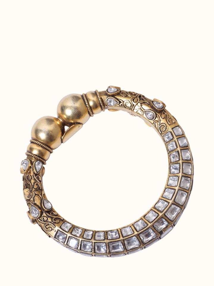 Detail view of Jadau Silver Bangle highlighting the stone setting and metalwork detail, from a different angle