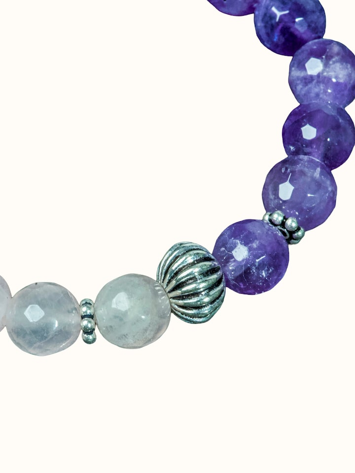 Detail view of Gemstone Rose Quartz & Amethyst Bead Silver Bracelet highlighting the stone setting and metalwork detail