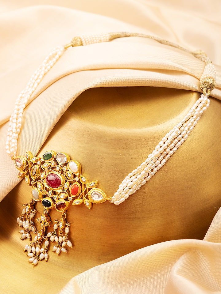 Detailed close-up of Navratna silver choker showcasing its ornate gemstone settings and fine silver work