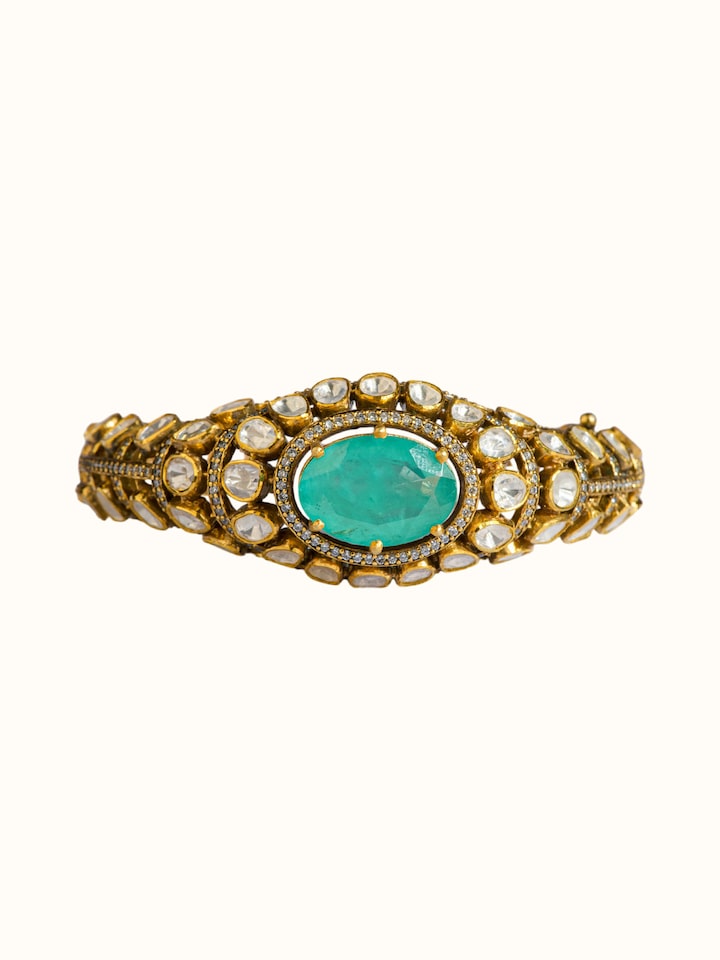 detail view of silver smithing gold plated bangle design