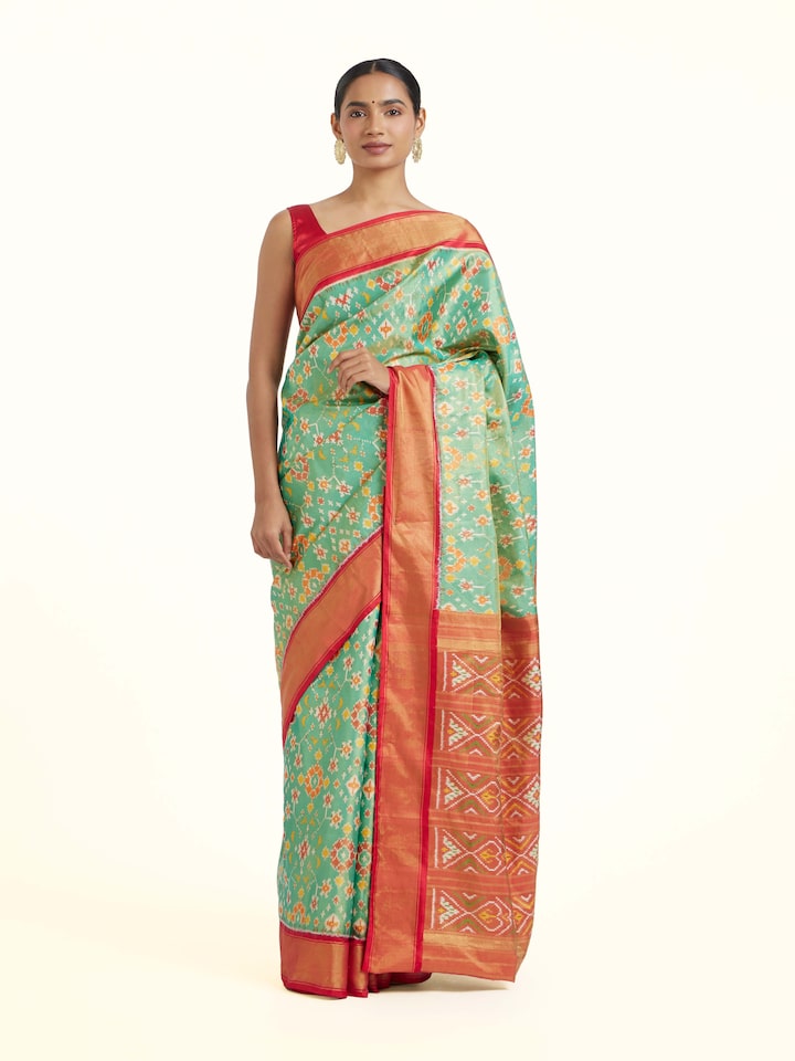 Front view of Brown Pochampally Ikat Silk Saree showcasing its traditional craftsmanship and design