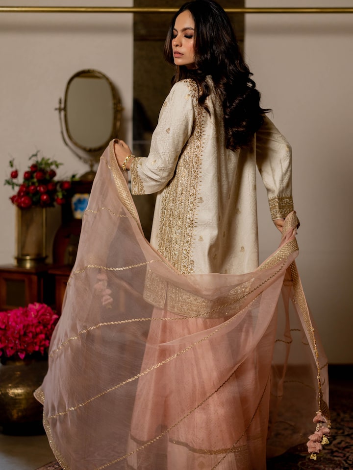 Angled view of the Blush Pink Silk Leheriya Embroidered Organza Dupatta