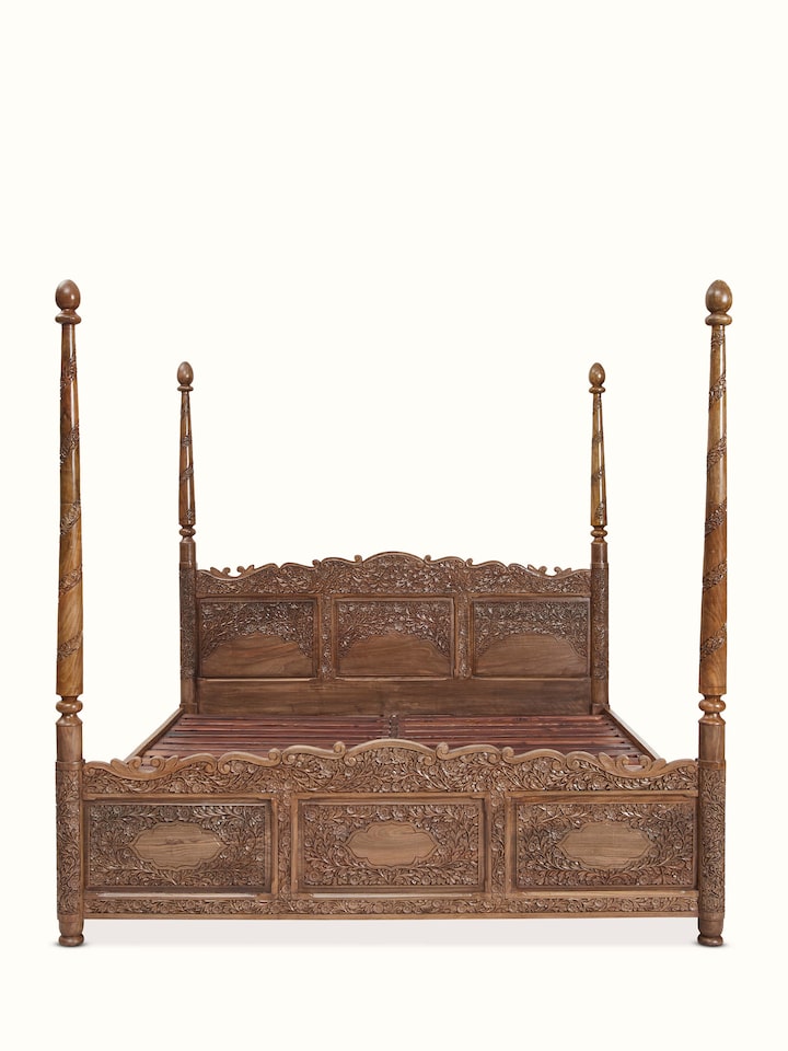 Front view of Carved Walnut Wood Poster Bed showing the front design and silhouette
