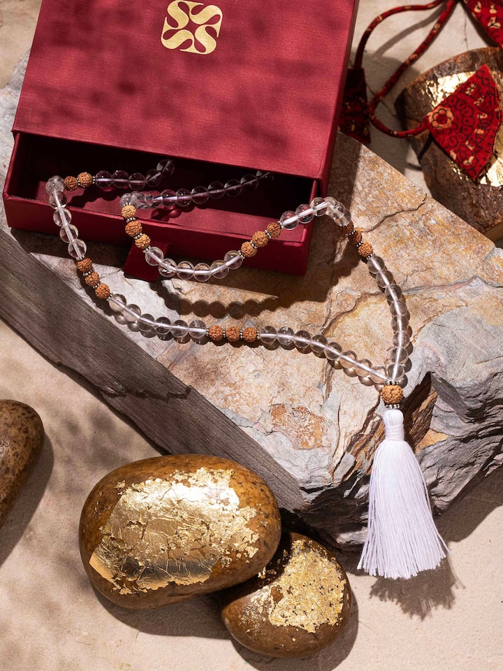 Side view of Rudraksha & Sphatik Silver Mala, showcasing the alternating Rudraksha and sphatik beads