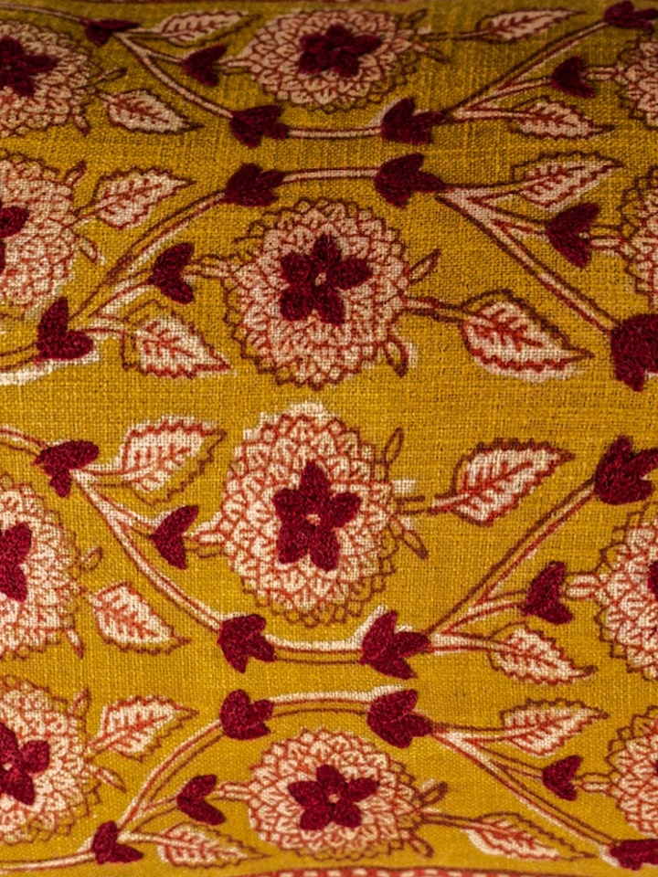 Close-up of the Marigold Hand Block Dabu With Embroidery Floral Cushion