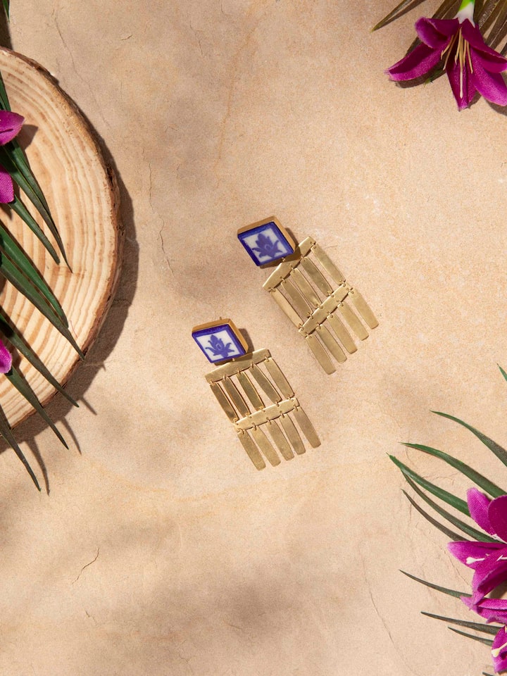 Side view of Blue Pottery Drop Earrings emphasizing the vibrant blue pottery and detailed design