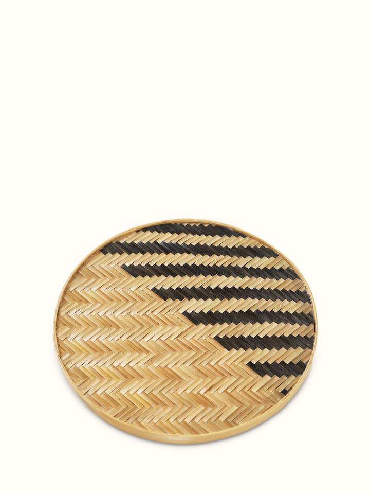 Close-up emphasizing the natural texture and fine detailing of the hand-crafted bamboo fibres