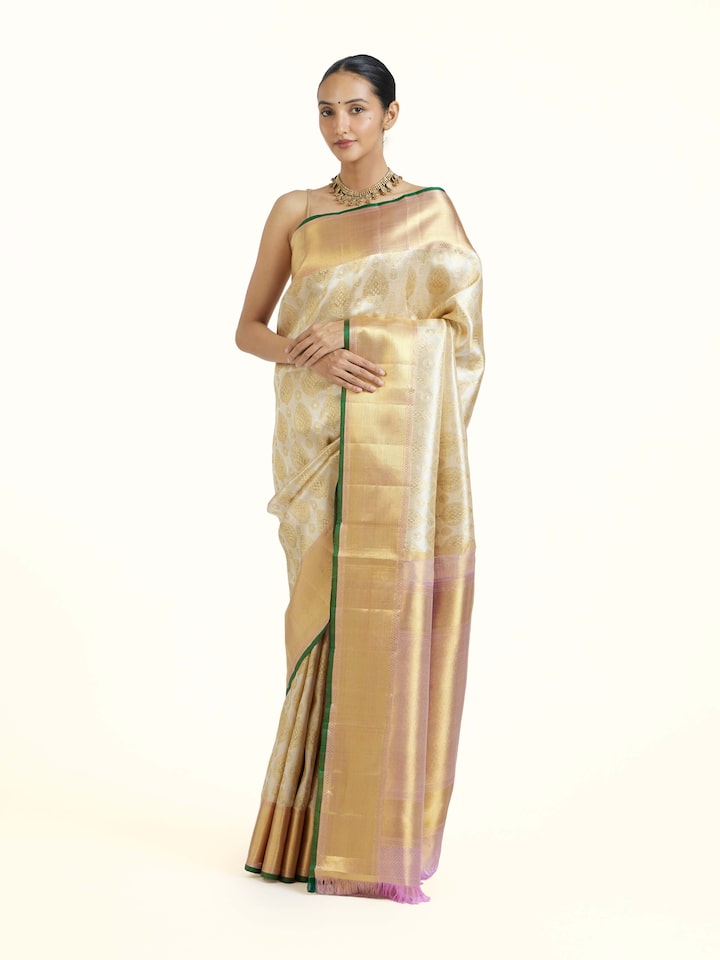 Side view of Gold Kancheepuram Silk Zari Saree highlighting the detailed craftsmanship and elegant silhouette