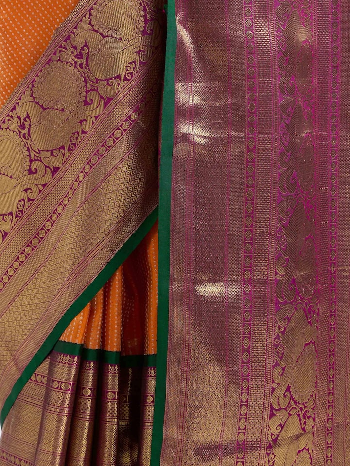 Detail view of mango silk Kancheepuram saree showing silk texture and craftsmanship