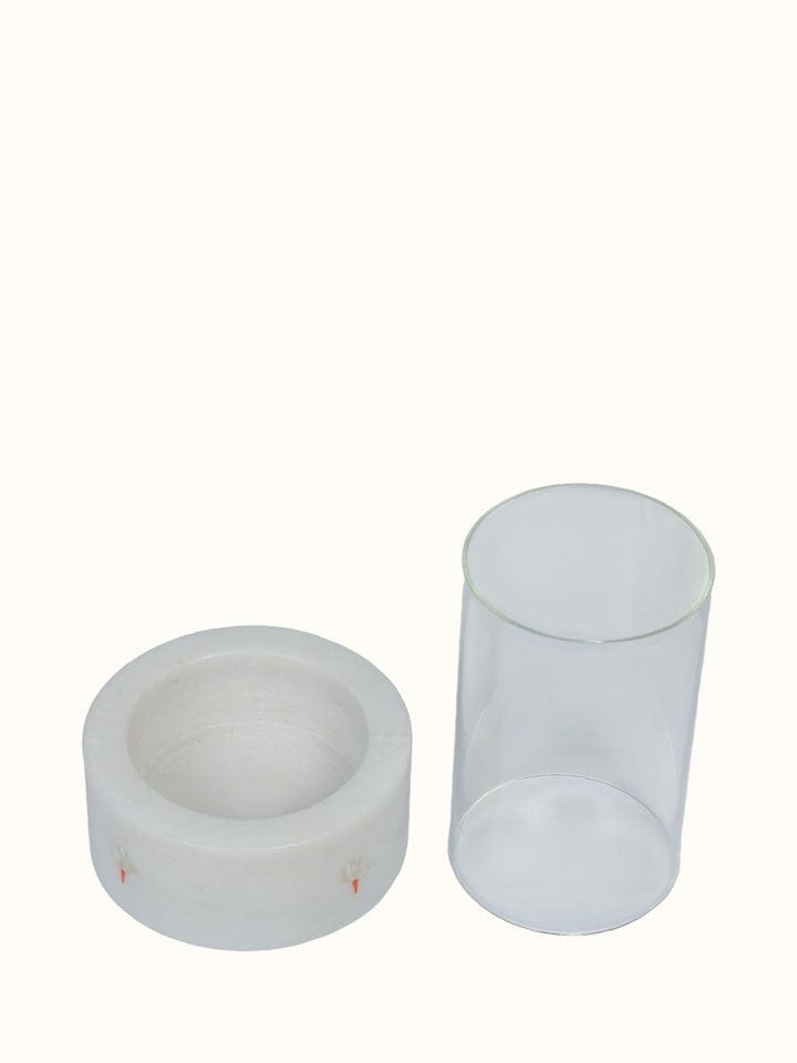 close-up view of marble inlay pacchikari candle holder pattern