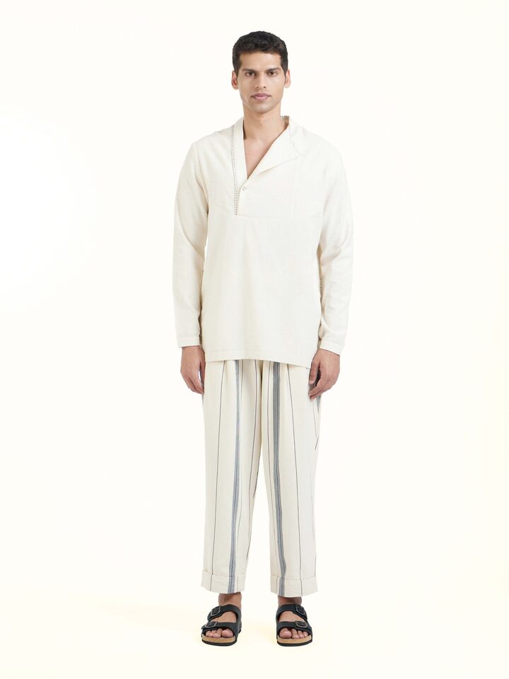 Front view of ivory cotton handloom short kurta with minimal design