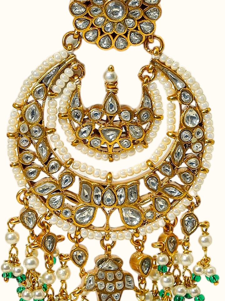 Detail view of Jadau Silver Chandbalis highlighting the stone setting and metalwork detail