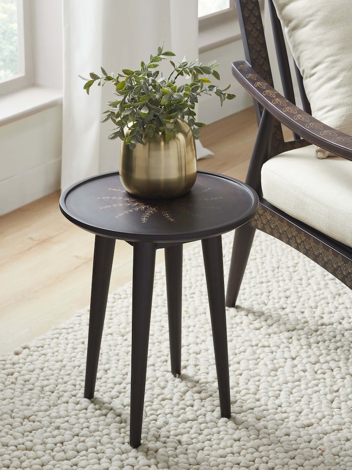 Side view of the Sheesham wood and brass Tarkashi table, highlighting the detailed craftsmanship and design.