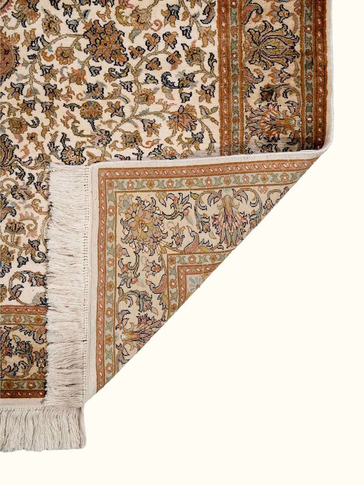 Back view of Traditional Persian Ivory Kashan Kashmir Silk Hand-Knotted Carpet showing the reverse weave