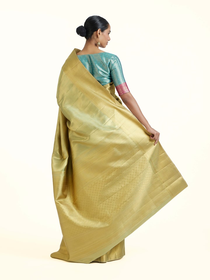 Back view of Green Kancheepuram Silk Zari Saree emphasizing the overall design and fine details