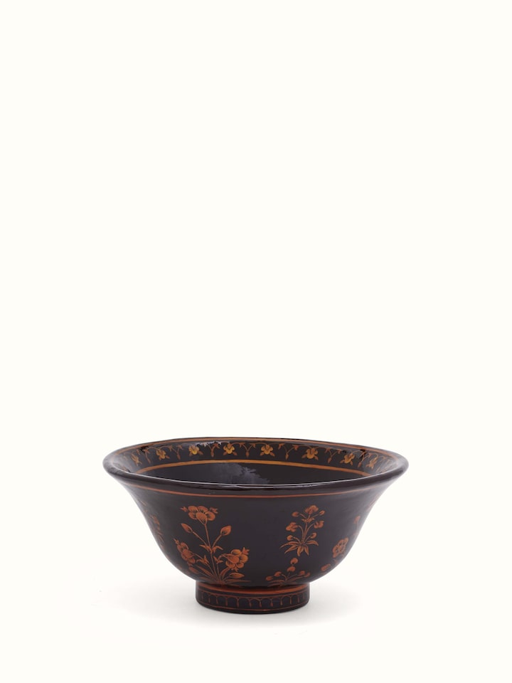 Detailed close-up of Black papier mache paper pulp bowl