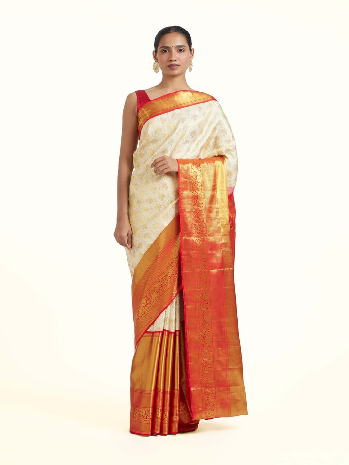 front view of white silk dharmavaram saree with elegant design