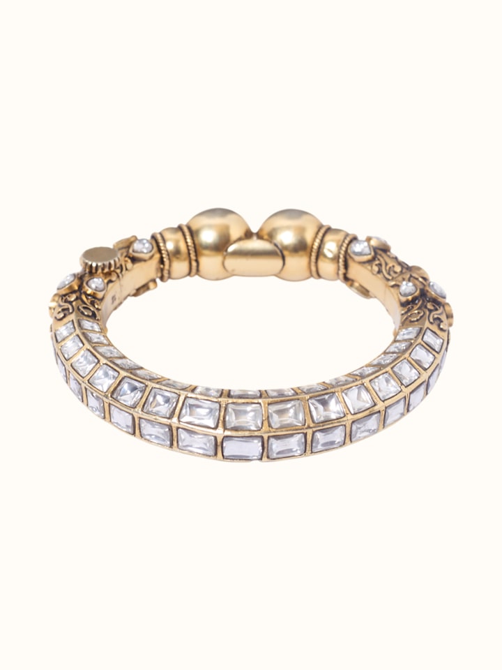 Detail view of Jadau Silver Bangle highlighting the stone setting and metalwork detail