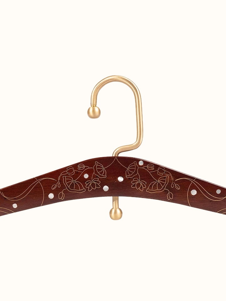 Detail view of Kamal Tarkashi Teak Wood Hanger highlighting the handcrafted detailing and finish