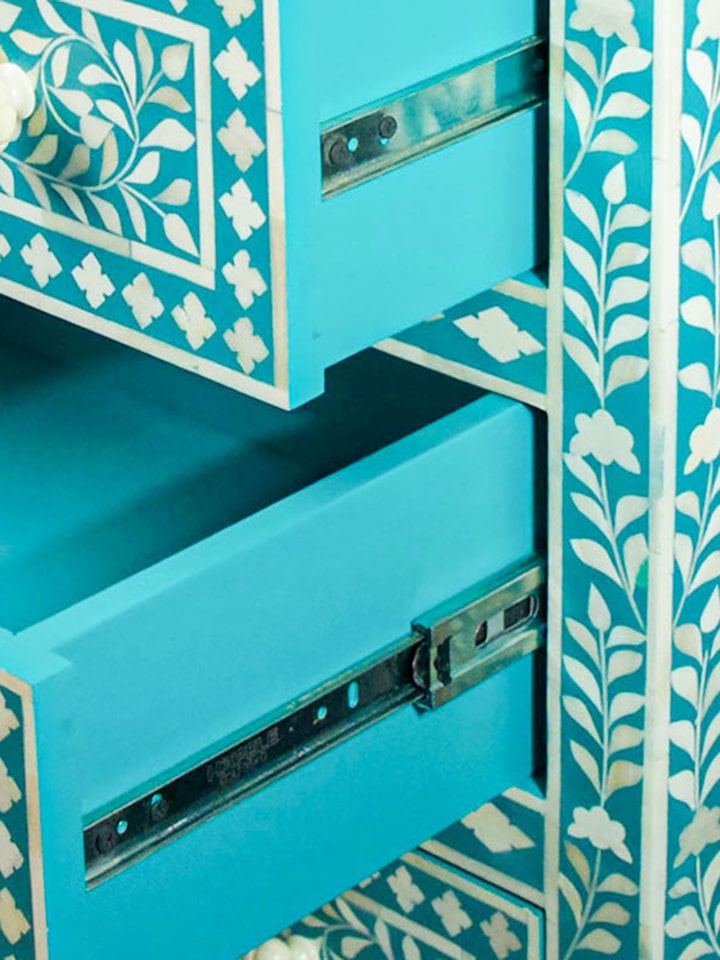 Detail view of Bone Inlay Chest of Drawers highlighting the woodwork and finish detail, from a different angle
