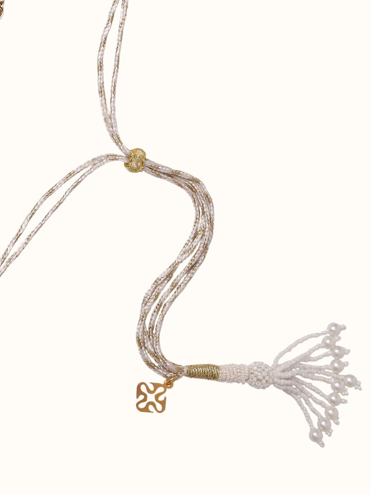 Close-up detail of silver smithing choker necklace