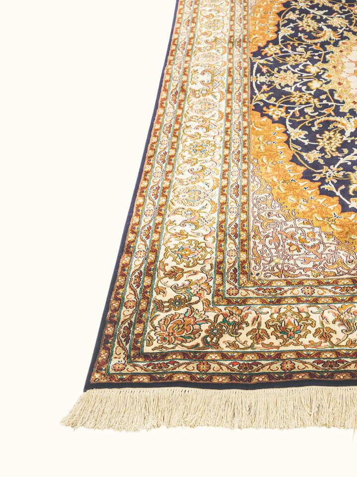 Top view of the Traditional Persian Navy Rust Isfahan Kashmir Silk Hand-Knotted Carpet