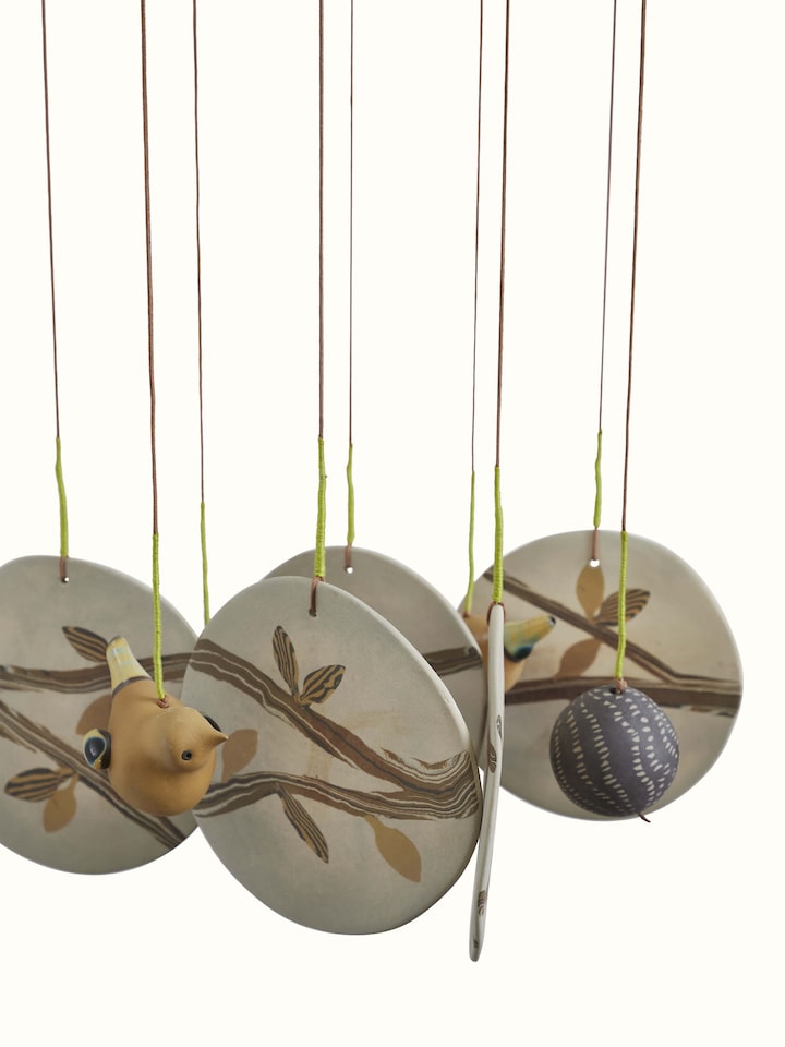 Detailed view of Tranquil Ceramicware Clay Wind Chime focusing on the fine clay texture and peaceful aesthetic